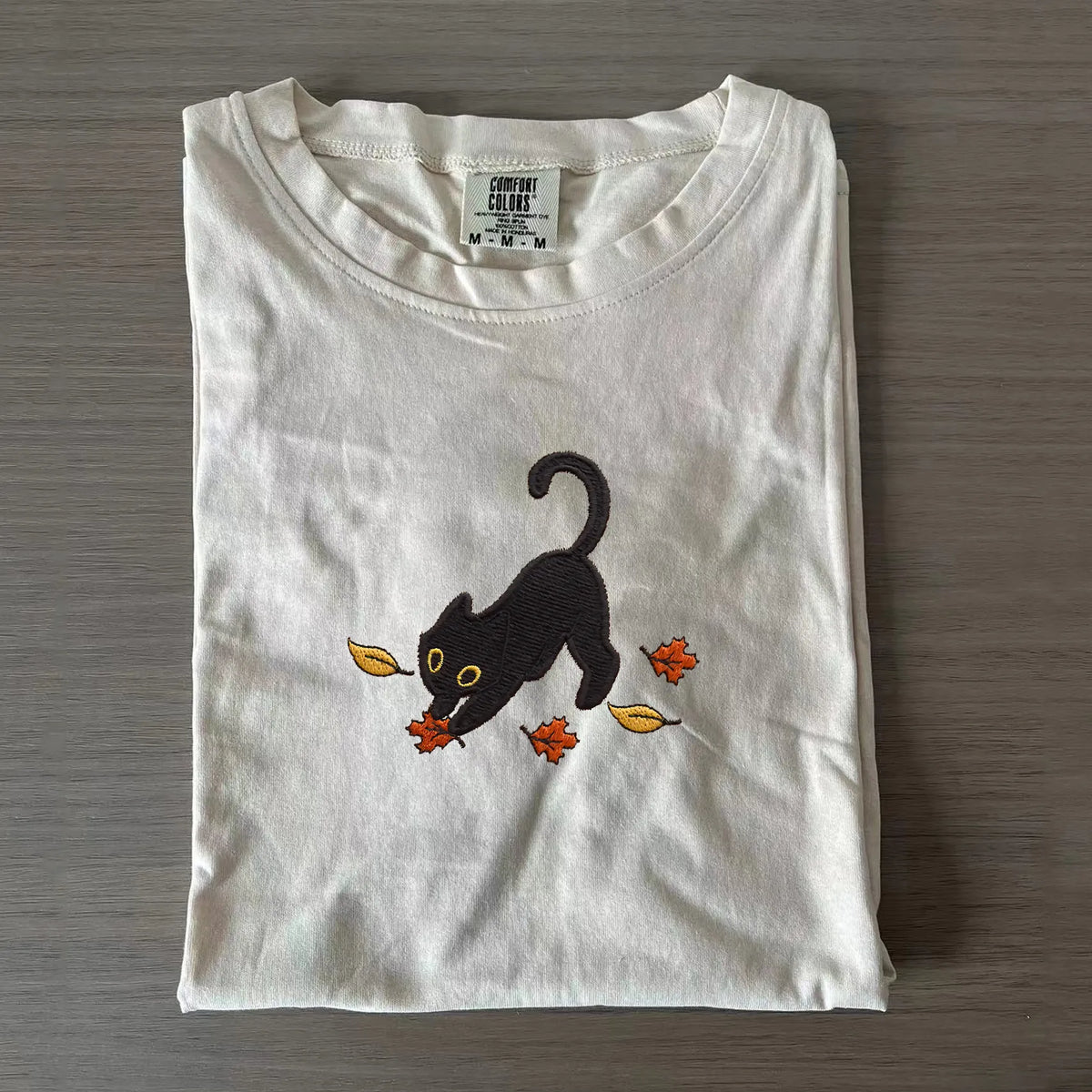 Cat Pouncing Leaves Embroidered T-shirt
